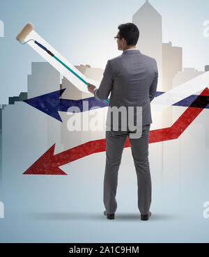 Der Geschäftsmann Zeichnen von Diagrammen in Prognosen Konzept Stockfoto