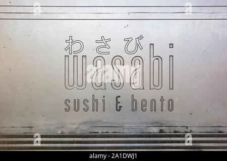 Wasabi Sushi und Bento Restaurant signage in London, Großbritannien Stockfoto