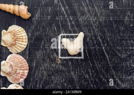 Häkchen auf der Checkliste, Ticken Sie in das Kästchen Konzept.. Meeresmotiv Stockfoto