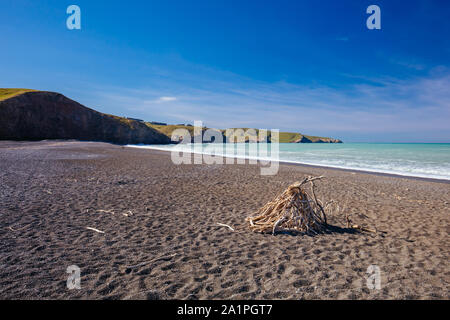 Birdlings flachen Strand an einem sonnigen Tag in Neuseeland Stockfoto