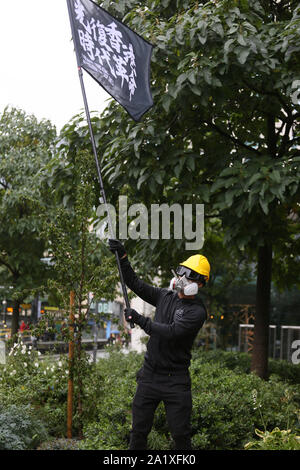 Manchester, Großbritannien. 29. September 2019. Mitglieder der chinesischen Gemeinschaft in der Stadt außerhalb der Tories Konferenz die Aufmerksamkeit auf ihre Solidarität für die chinesische Bevölkerung in Hongkong, die Unruhen gesehen hat. Manchester, Lancashire, UK. Quelle: Barbara Koch/Alamy leben Nachrichten Stockfoto