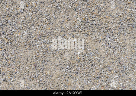 Boden Stein hellen Hintergrund aus vielen kleinen Steinen. closeup von vielen kleinen Stein, abstrakte Textur natürlich. Stockfoto