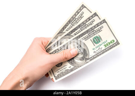 Dollar in der Frau die Hand auf weißem Hintergrund. Stockfoto