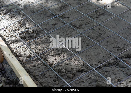 Bild von Beton gießt auf einer Schalung Fußboden auf einer Baustelle Stockfoto