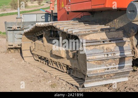 Kette Antrieb einer Planierraupe im Detail Stockfoto