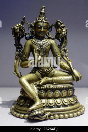 Sitzende Figur, Indien, ca. 1100-1199 Tibet, Überfluss, 800-1900. Die Bronze und Kupfer Abbildung zeigt Avalokiteshvara, die Verkörperung des unendlichen Mitgefühls im Mahayana Buddhismus. Stockfoto