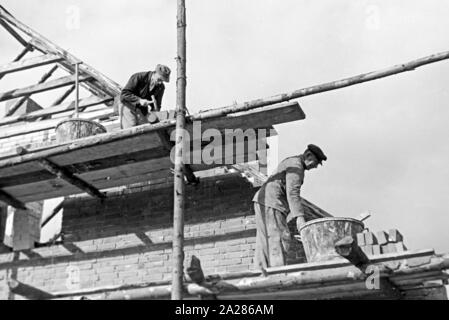 Wiederaufbau im Emsland, 1945-1949. Wiederaufbauarbeiten in Ems region, 1945-49. Stockfoto