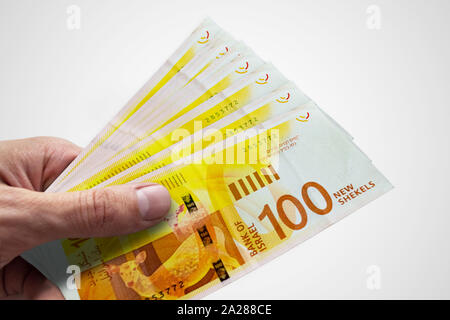 Hand, die israelischen Schekel. ILS. Geld in Israel Stockfoto