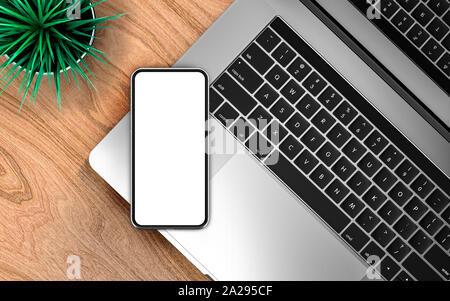 Smartphone und Laptop Vorlage, auf einem Holztisch isoliert. Mockup. Stockfoto