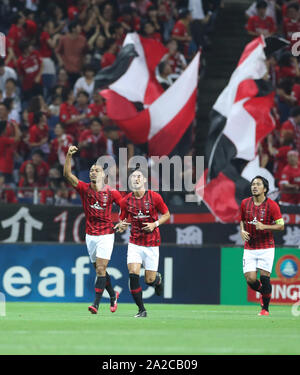 Saitama, Japan. 2. Okt, 2019. Fabricio (1. L) der Urawa Red Diamonds feiert nach zählen während der AFC Champions League Fußball Halbfinale Hinspiel Übereinstimmung zwischen den Urawa Red Diamonds aus Japan und Guangzhou Evergrande FC Chinas in Saitama, Japan, Oktober 2, 2019. Urawa Red Diamonds gewann das Match mit 2:0. Credit: Du Xiaoyi/Xinhua/Alamy leben Nachrichten Stockfoto