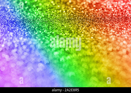 Abstrakte Komposition. Regenbogen Farben glitter hellen Hintergrund mit schönen Bokeh, selektiver Fokus, geringe Tiefenschärfe Stockfoto