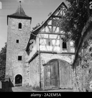 Malerischer kleiner Stadtturm in Rothenburg o.d. Tauber, Deutschland 1930er Jahre. Malerische kleine Stadt Turm in Rothenburg o.d. Tauber, Deutschland 1930. Stockfoto