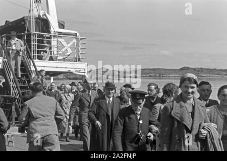 Passagiere auf der KdF-Nordlandfahrt / Pfalz mit dem Schiff "Wilhelm Gustloff", Deutschland 1930er Jahre. Passagier der Kreuzfahrt nach Norwegen mit dem KdF-Schiff "Wilhelm Gustloff", Deutschland 1930. Stockfoto