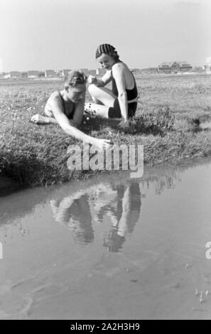 Sommerferien auf der Nordseeinsel Juist, Deutsches Reich 30er Jahre. Sommer Urlaub auf der Nordsee Insel Juist, Deutschland 1930. Stockfoto