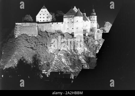 Heidenheim an der Brenz bei Nacht, Deutsches Reich 30er Jahre. Heidenheim an der Brenz in der Nacht, Deutschland 1930. Stockfoto