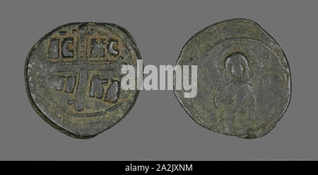 Anonymer Follis (Münze), an Theodora, AD 1055/1056, byzantinischen, Byzantinisches Reich, Bronze, Diam zugeschrieben. 3 cm, 8,22 g Stockfoto