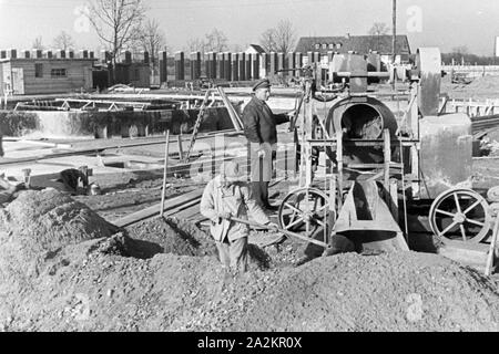 Beim Bau der Reichsausstellung DES chaffendes Volk' in Düsseldorf Schlageterstadt, Deutschland 1930er Jahre. Planung, Konzeptionierung und Gebäude der Reichsausstellung chaffendes Volk' Ausstellung im Düsseldorfer Schlagerterstadt, Deutschland 1930. Stockfoto