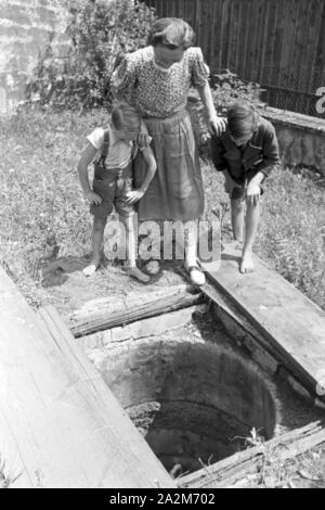 Ein mit Erdgas befeuerter Haushalt, Deutsches Reich 30er Jahre. Ein Gas beleuchteten Haushalt, Deutschland 1930. Stockfoto