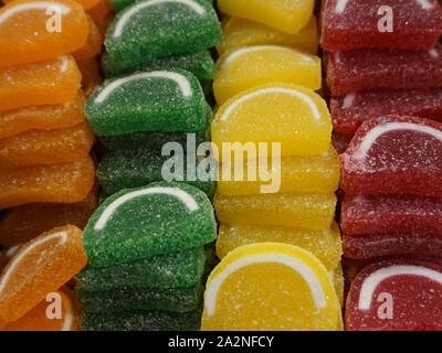 Stapel der leckere Gelee geformte Citrus Bonbons Textur Hintergrund Stockfoto