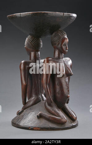 Hocker mit Janus weiblichen Figuren, Zela, Anfang des 20. Jahrhunderts, Holz, 15-1/8 x 9 x 9 in., Afrikanische Kunst Stockfoto