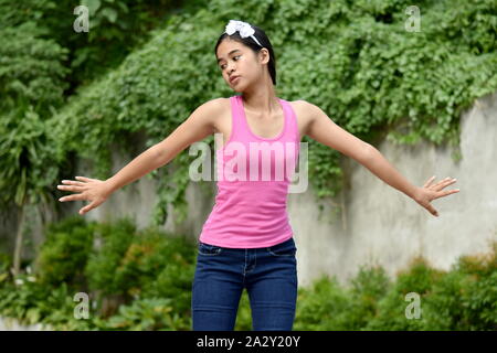Eine schlanke junge Filipina Mädchen Jugend Stockfoto