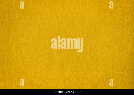 Textur von echten gelben Pullover, Textil- Hintergrund. Zusammenfassung Hintergrund Stockfoto