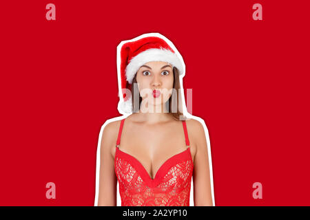 Unglaublich funky jugendlich Frau in Mütze posieren. Zeitschrift collage Stil mit trendigen Farbe Hintergrund. Frohe Weihnachten und Neujahr Konzept. Stockfoto