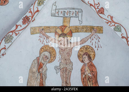 Die Kreuzigung Jesu, ein Fresko, etwa ab dem Jahr 1500 in der Kirche St. Maria, Elsinore, Dänemark, 14. Mai 2019 Stockfoto