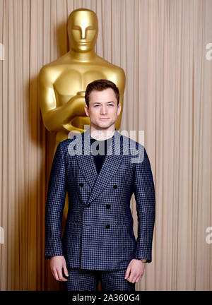 Taron Egerton an der Akademie der Künste und Wissenschaften neue Mitglieder Partei 2019 an die Freimaurer Hall in London statt. Stockfoto