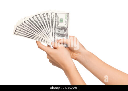 Erfolgreiche Investition. Fan von Dollar Banknoten in weibliche Hände Stockfoto