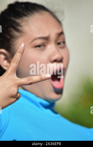 Eine junge Filipina weiblich Spaß Stockfoto