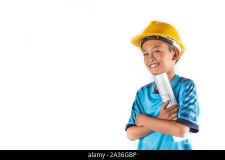 Der kleine Junge im Traum will ein Architekt oder Ingenieur in der Zukunft sein. Stockfoto