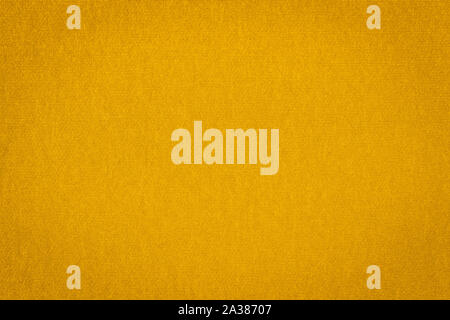 Textur von echten gelben Pullover, Textil- Hintergrund. Zusammenfassung Hintergrund Stockfoto
