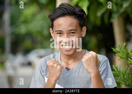 Ein wahnsinnig schöner Asiatischen Teenager Boy Stockfoto