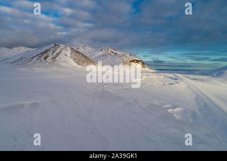 Berserkjahraun, Schnee bedeckte Lavafeld mit Krater, Halbinsel Snaefellsnes, Island Stockfoto