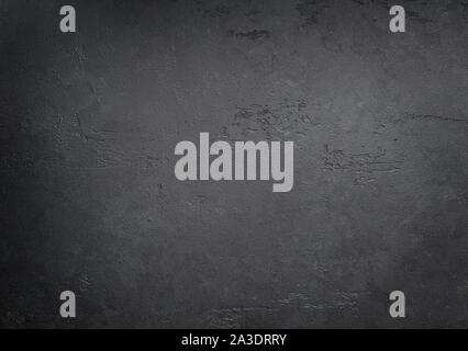 Schwarzer Schiefer oder Stein. Dunkle konkrete Textur. Stockfoto