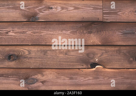 Holzzaun mit einem Knoten und Nägel. Holzbohlen, Holz Oberfläche. Schmutzige wand hintergrund, grunge Textur. Vintage rustikal Muster von Braun. Anmelden hinterg Stockfoto