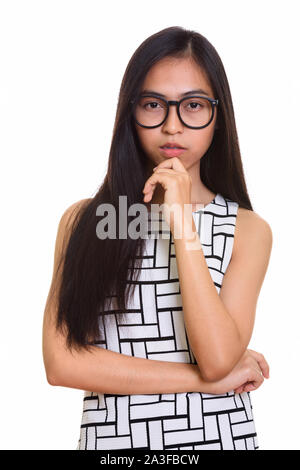 Studio geschossen von jungen asiatischen Teenager nerd Mädchen denken Stockfoto