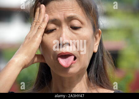 Eine kranke Frau Senior Stockfoto