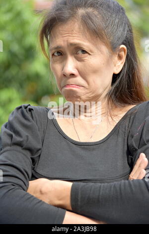 Eine hartnäckige Senior Filipina Person Stockfoto