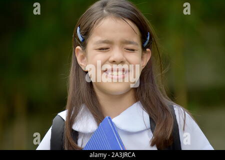 Betonte Prep Student Kind tragen Einheitliche Stockfoto