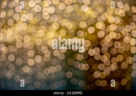 Die Unschärfe der Glühlampe für dekorative Gelbgold, wie der Hintergrund. Stockfoto