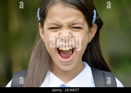 Stressvolle Junge Diverse Mädchen Schüler tragen Schuluniform Stockfoto