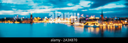 Stockholm, Schweden. Night Skyline abstrakte Boke Bokeh Hintergrund. Design Hintergrund. Panorama Panoramablick. Stockfoto