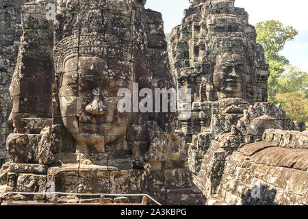 Gesichter in Stein gemeißelt in Bayon Tempel Türme, Angkor Wat, Kambodscha, Siem Reap Stockfoto