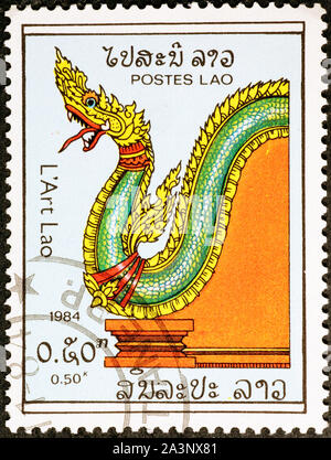 Mythologische grüne Drache auf laotischen Briefmarke Stockfoto