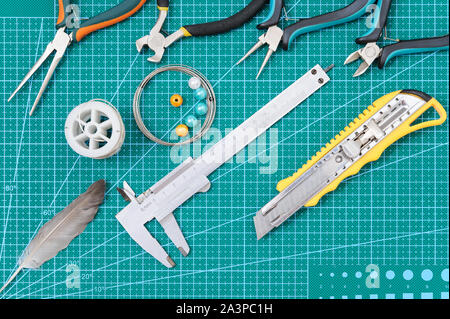 Stillleben mit Tools für handgemachte auf dem Pad. Stockfoto