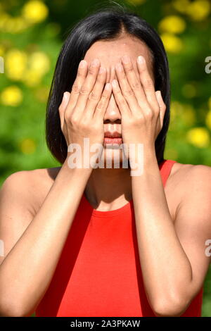 Beschämend erwachsene Frau Stockfoto