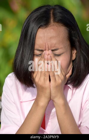 Ein erwachsenes Weibchen mit Allergien Stockfoto