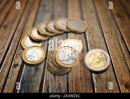 Stack Stapel von Euro-münzen auf hölzernen strukturierte Tabelle Stockfoto